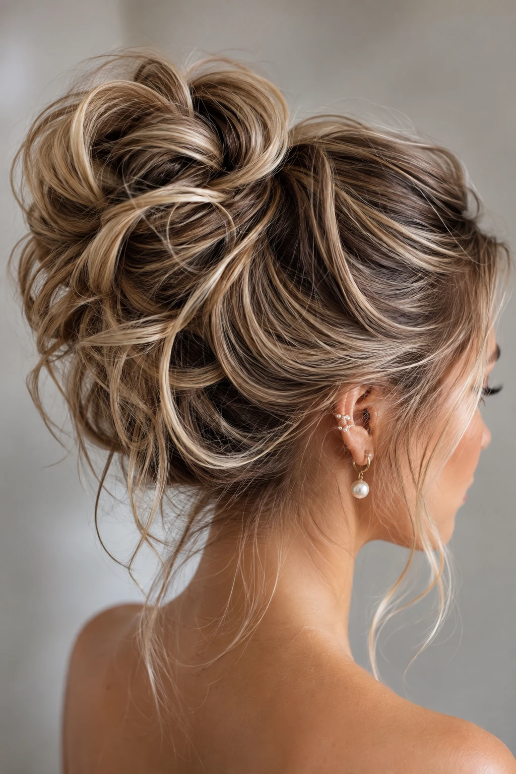 Tousled High Bun with Pearl Drop Earring
