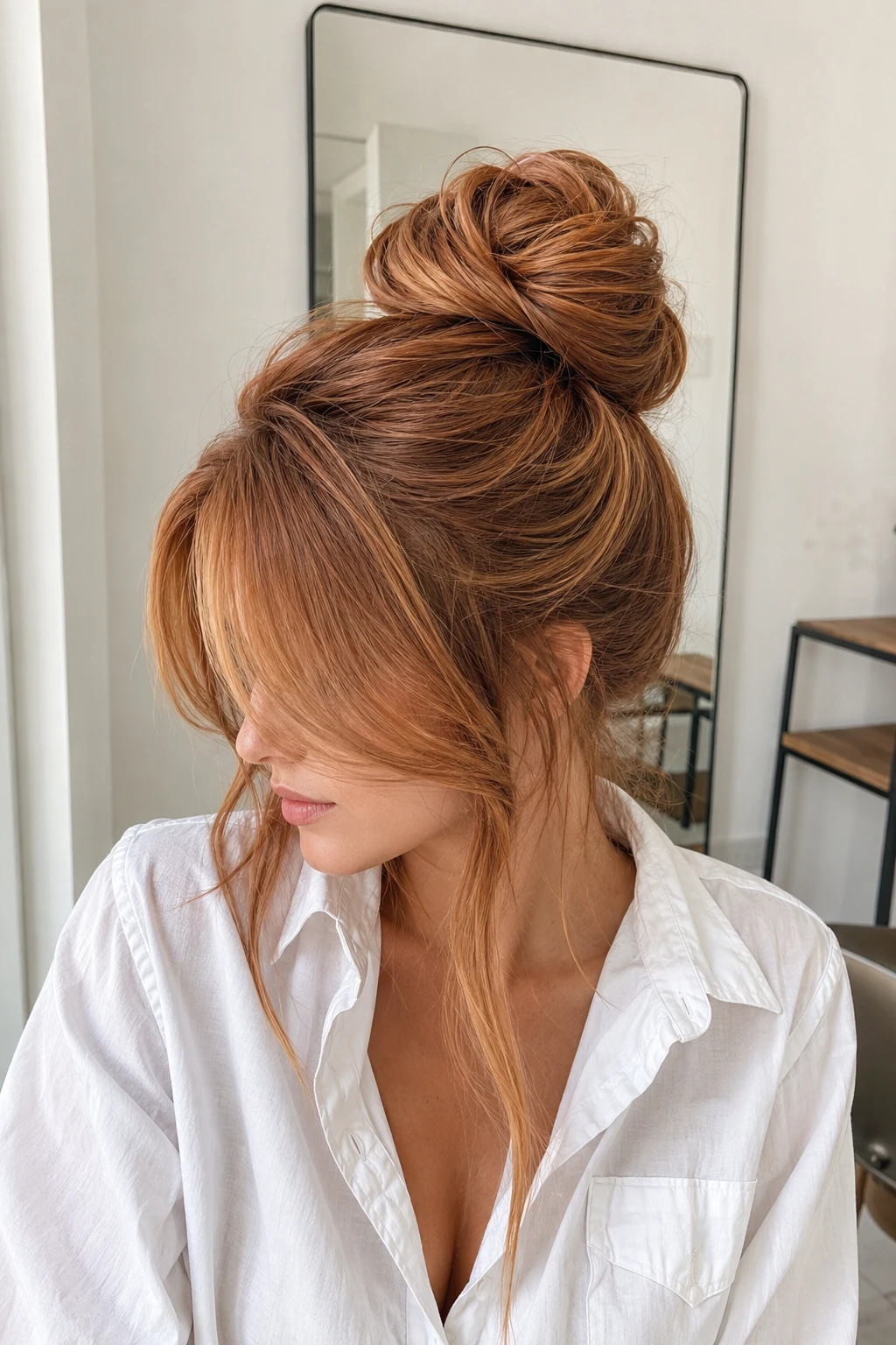 Copper High Bun with Side Swept Bangs