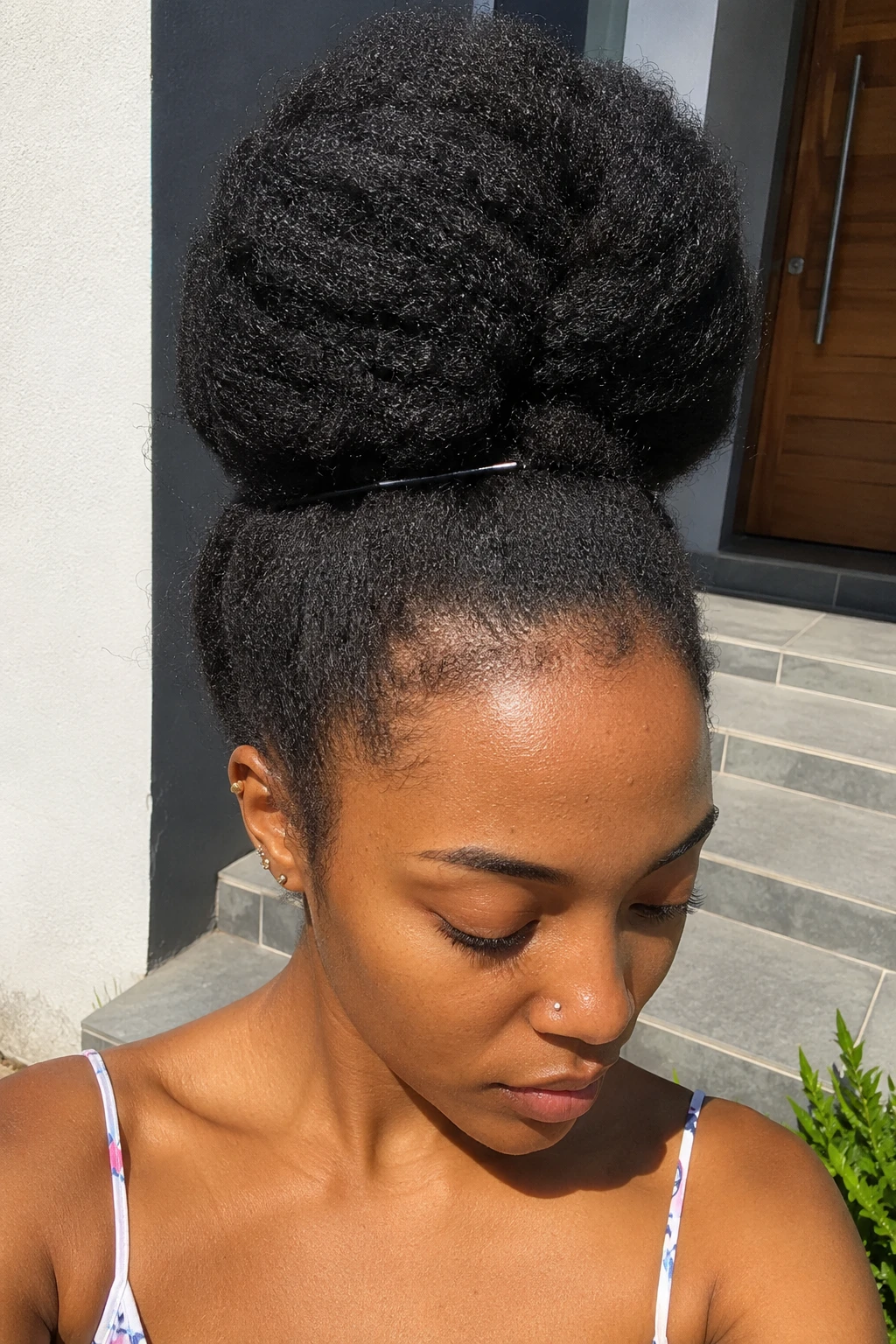 Puffy High Bun with Center Part