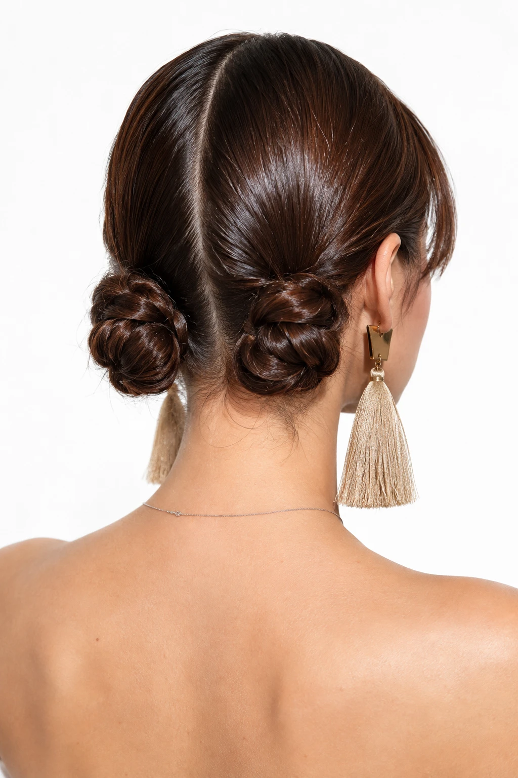 Low Twisted Space Buns with Sleek Center Part